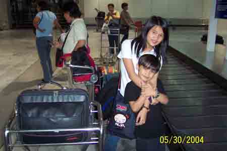 At the conveyor...awaitng more baggages NAIA Terminal II
