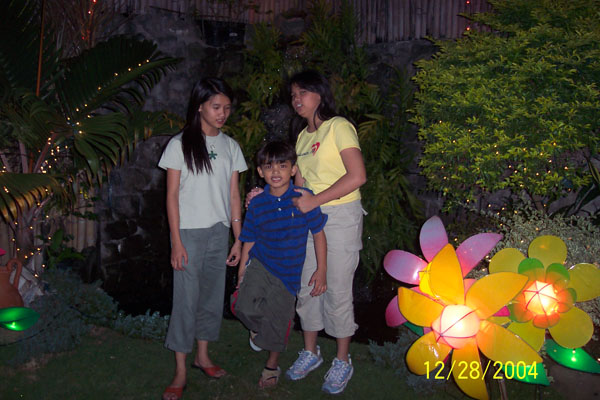 My 3 children visiting Fr. Roy's garden (beside's church)
