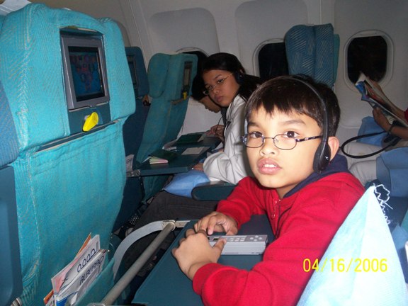 inside the plane Carlo playing games
