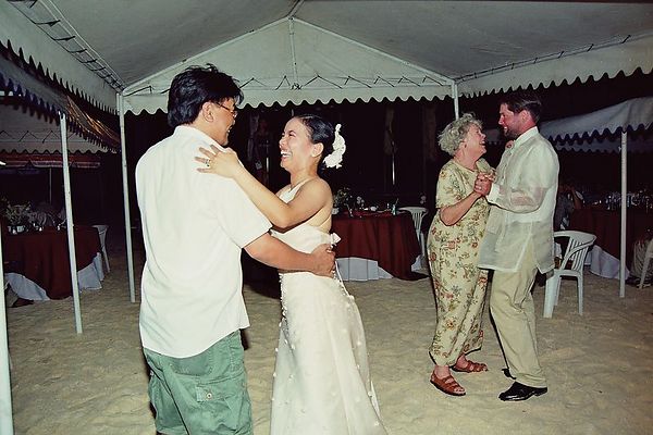 Dancing on the beach with the newly wed
