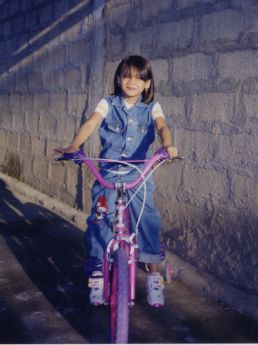 Tricia in her new barbie bike
